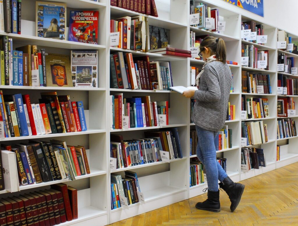 Women browsing books at foreign bookstore