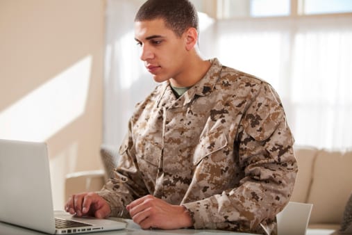 Military-Connected Student works on a laptop