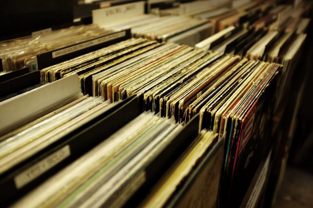 stacks of vinal records in crates